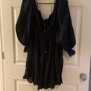 Free People. Black off shoulder dress. Brand New w/ Tags. Size Medium.